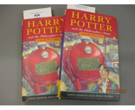 J. K. Rowling, Harry Potter and the Philosophers Stone, First Edition, 22nd printing, with dust jacket, together with another