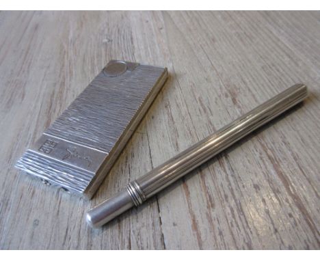Givenchy, silver plated slimline lighter with machine finish, together with a white metal travelling fountain pen 