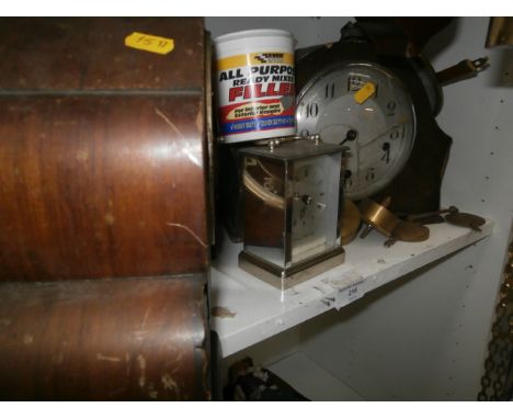 shelf of clocks and clock parts