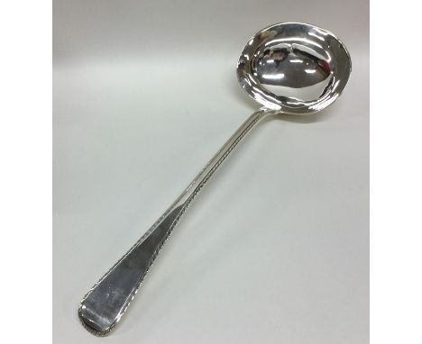 A good crested silver OE pattern soup ladle with feather edge border. London 1868. By GA. Approx. 243 grams. Est. £200 - £300