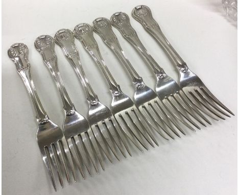 A good set of seven Honeysuckle pattern silver table forks. London. By R&amp;R. Approx. 715 grams. Est. £300 - £500.