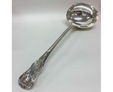 A heavy large Georgian silver soup ladle.  London 1825. By William Chawner. Approx. 306 grams. Est. £150 - £200.