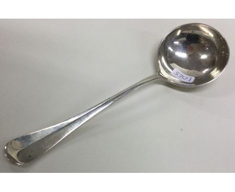 A heavy OE and rat tail pattern silver sauce ladle. Chester. By SW Ltd. Approx. 80 grams. Est. £30 - £40.