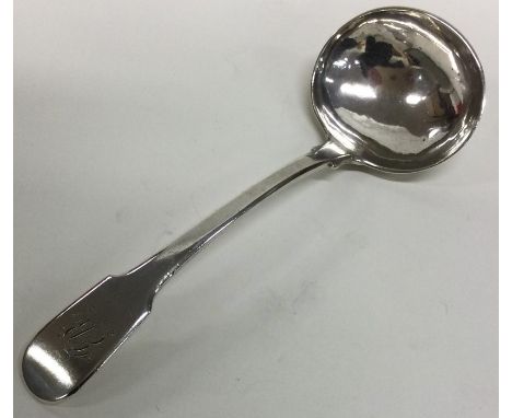 A heavy fiddle pattern silver sauce ladle with initialled terminal. Possibly Provincial? Approx. 71 grams. Est. £45 - £55.