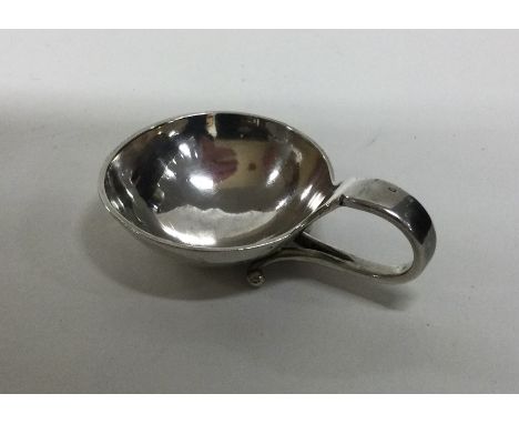 GEORG JENSEN: A stylish silver caddy spoon of tapered form. Approx. 15 grams. Est. £45 - £55.