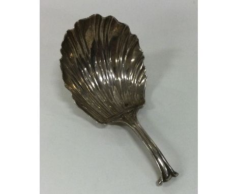 An unusual Georgian silver caddy spoon. Approx. 15 grams. Apparently unmarked. Est. £20 - £30.
