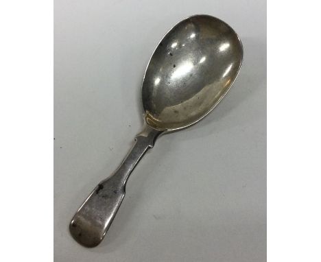 A fiddle pattern silver caddy spoon. London. By DP. Approx. 14 grams. Est. £30 - £50.