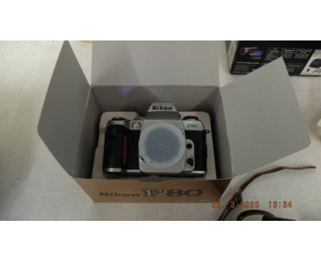 A boxed Nikon camera