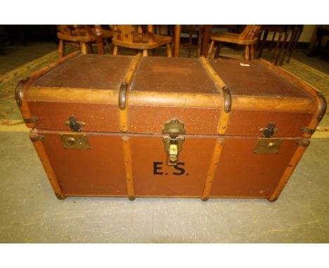 Wooden banded trunk and contents of mixed fabric etc