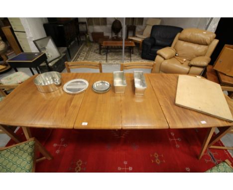 Light Ercol extending dining table (5 legs) with double folding leaf that stacks away underneath