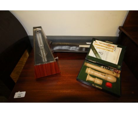 Two recorders and a metronome