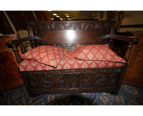 Carved oak monks bench