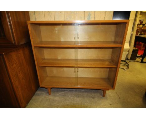 Mid century glazed light oak bookcase