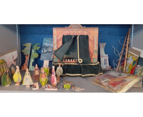 A mid 20th century puppet theatre with wooden and cardboard props 37cm h x 34cm w x 17cm d Location: 
