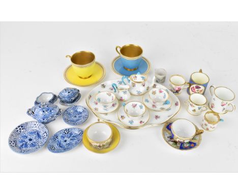 A Crown Staffordshire miniature porcelain cabaret set, with floral pattern, together with two miniature German cups and sauce