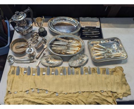 A mixed lot of silver plate to include lidded dishes, flatware to include silver collared examples, wine coaster, a Ronson ta