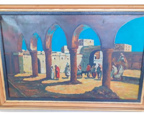 An oil on canvas of a North African/Middle Eastern scene under the archway, signed T.B**K*Y to the left hand corner, in a bla