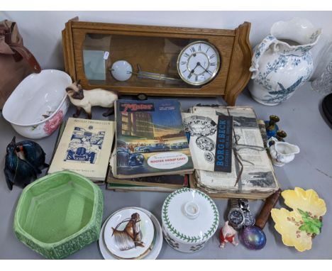 A mixed lot to include a Hermle 8-day wall clock 'The Motor' magazines, wash jug, Casio watch, Beswick cat and other itemsLoc