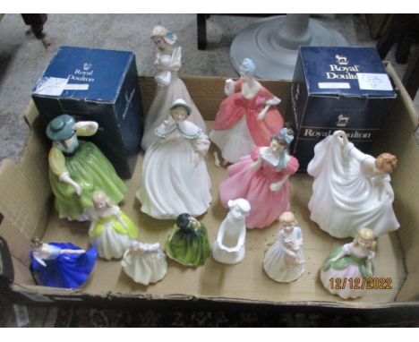 A group of Royal Doulton lady figurines, two boxed to include Buttercup HN2309, Dreaming from the Reflections series HN2479, 