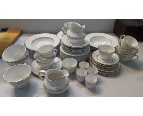 A Royal Doulton Fairfax pattern part tea and part dinner service, comprising of teacups, coffee cans, bowls, cream jugs, side