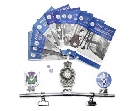 Assorted Ecurie Ecosse memorabilia,comprising an enamel member's car badge, mounted on a badge bar with a Scottish Motor Raci