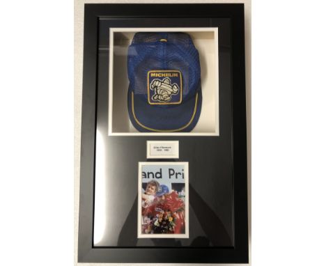 A Michelin cap signed by Gilles Villeneuve,the blue cap with yellow trim and with embroidered Michelin Bibendum patch, faintl