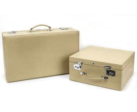 Two Bentley GT Continental leather cases, by Trunks of Haslemere,bespoke cases in beige leather, each with applied Winged 'B'