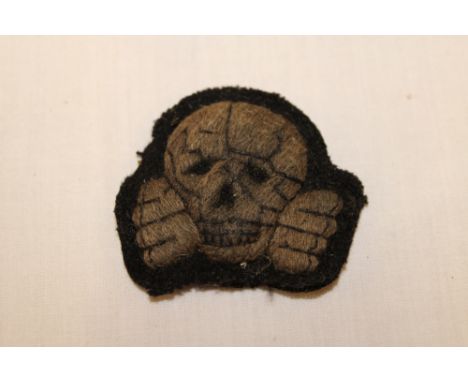 A rare Second War Waffen SS Panzer beret skull badge