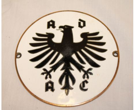 A 1950s German enamelled circular Automobile Club badge, 3½" diameter