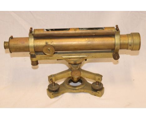 A brass surveyor's theodolite/level by Troughton and Simms of London (minus spirit level) 14½" long 