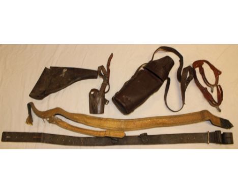 A First War officers leather holster, Sam Browne belt, sword hanger, pair of spurs etc