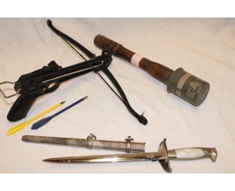 A copy Second War German stick grenade, copy German dagger and a small crossbow (3) 