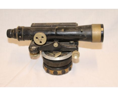 A brass mounted painted metal surveyor's theodolite by E.R.Watts of London, 9½" long 
