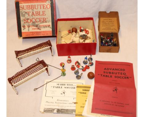 A selection of old Subbuteo table soccer figures, goals and accessories in original box with instructions etc
