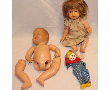 A German china headed baby doll, one other celluloid doll etc 