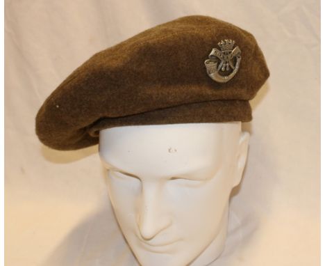 A Second War Khaki beret with DCLI badge 