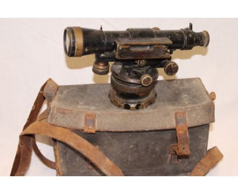 An old painted metal surveyor's theodolite by W. Erskine Mayne Ltd Belfast, 10" long in leather case 