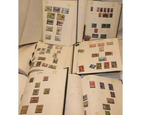 A large collection of various British Commonwealth stamps contained in six matching Tower stamp albums 