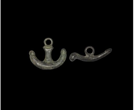 1st-2nd century AD.
A pair of bronze pendants, one a phallus with suspension ring to the upper face, the other an 'anchor' wi