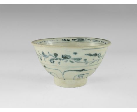 14th-15th century AD. 
A glazed ceramic bowl with basal ring, bell-shaped body with bands of blue tendrils and floral detaili