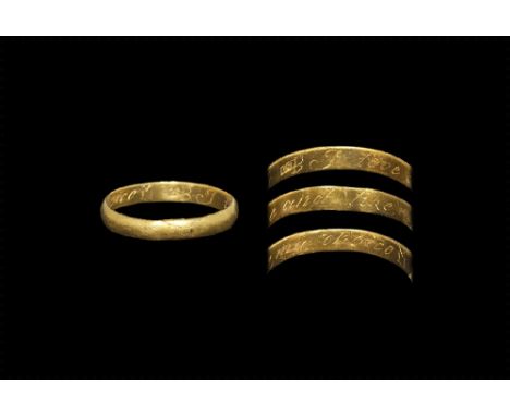 18th century AD. 
A D-section gold hoop with italic text to the inner face 'I love and like my choice' with seriffed initials