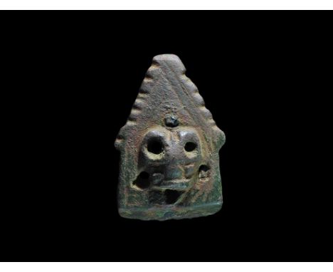 11th century AD. 
A copper-alloy stirrup mount of Williams's Class B Type 3 Group 1, triangular upper section ribbed on the o