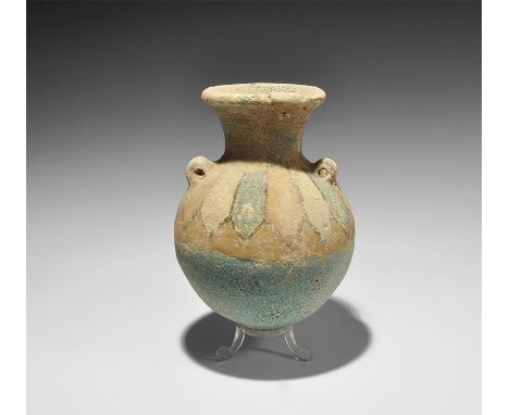 1st millennium BC. 
A spherical ceramic jar with funicular neck and rounded rim, two pierced lugs to the shoulders, segmented