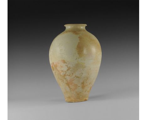 Tang Dynasty, 618-906 AD. 
A ceramic whiteware part-glazed piriform jar with short neck and chamfered rim. 2.8 kg, 32cm (12 3