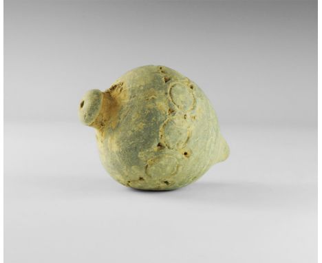 9th-11th century AD.
A hollow ceramic vessel with a thick conical nozzle, broad shoulder with band of roundels below, conical