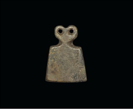 3rd millennium BC. 
A steatite(?) idol, flat in section, with trapezoidal body and two pierced discoid eyes above. 29 grams, 