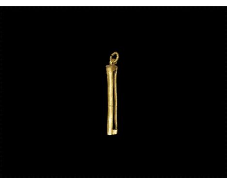 14th-15th century AD. 
A gold pendant comprising a D-section sleeve with open sides, ribbed suspension loop and twisted wire 
