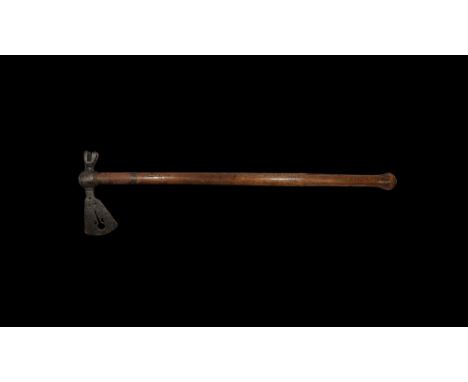 14th-15th century AD. 
A battle-axe comprising a stout wooden shaft with bulb finial, iron sleeve to the upper shaft with col