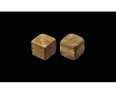 1st-3rd century AD. 
A pair of cuboid bone dice, each with ring-and-dot markings set out 1:6, 2:3, 4:5. 10 grams total, 14-15