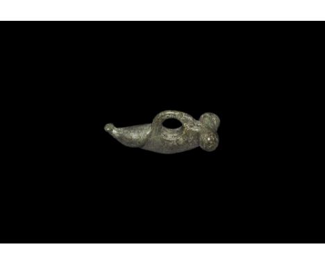 1st century BC-1st century AD.
A bronze pendant of a phallus with suspension loop above. 14 grams, 34mm (1 1/4").Very fine co